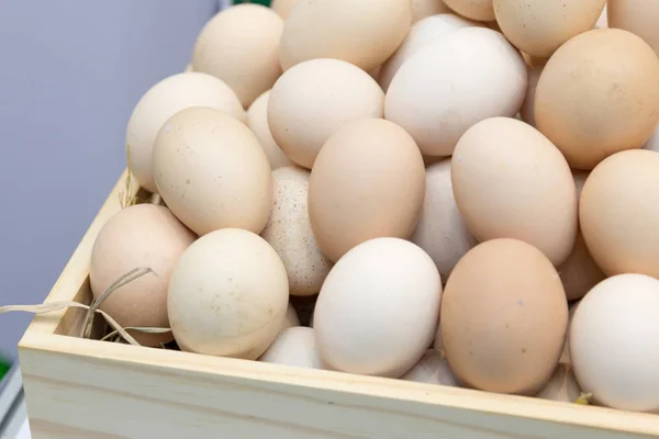 Stack of fresh eggs in the box