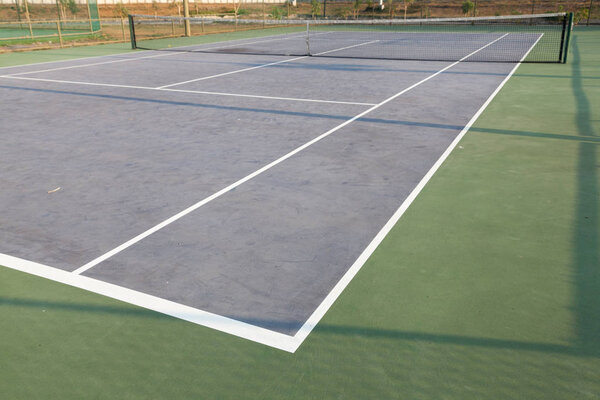 outdoor Tennis court on sunny day in thailand