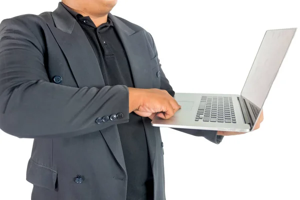 Businessman typing a notebook on white background — 스톡 사진