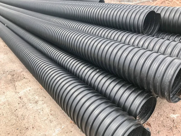 Big plastic tube pipe in construction site — Stock Photo, Image
