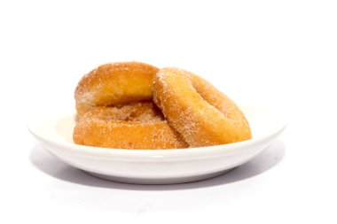 Donut on white plate isolated on white