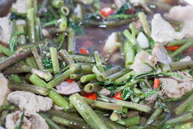 Thai Food Fried Morning Glory with Crispy Pork