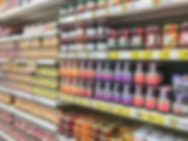 Borrosa de estantes de mermelada en el supermercado en Tailandia —  Fotos de Stock