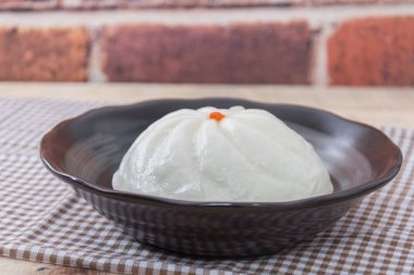 Chinese dim sum BBQ Pork Bun, Pandan pau or bao in plate