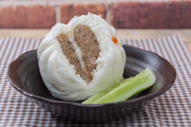 Chinese dim sum BBQ Pork Bun, Pandan pau or bao and cucumber in 