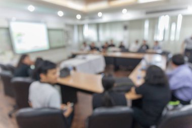 abstract blur people in meeting room at thailand