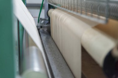  raw cotton in factory,cotton yarn in a textile mill.