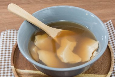  soy milk with barley, jelly, red beans and sesame on glass