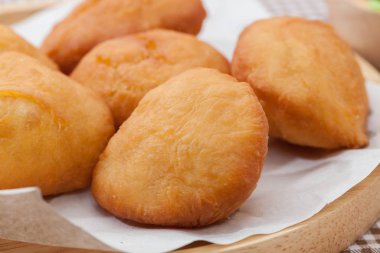 Chinese fried Dough bun on wooden plate