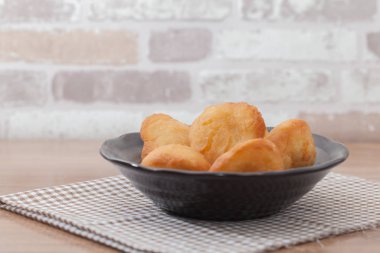 Chinese fried Dough bun on wooden plate