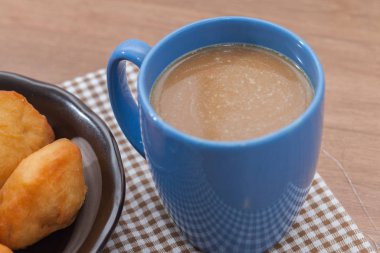 Chinese fried Dough bun with cup of coffee