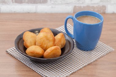 Chinese fried Dough bun with cup of coffee