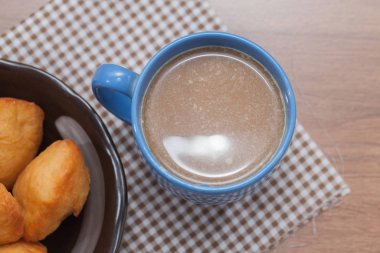 Chinese fried Dough bun with cup of coffee