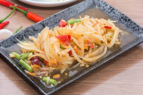 Papaya salad (som tum thai) on plate — 스톡 사진