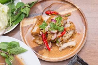 close up of Spicy minced pork salad on plate
