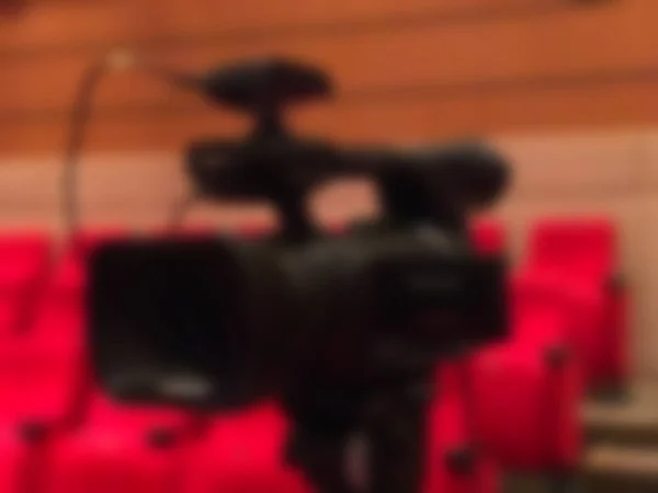 Blur of video camera in seminar room — Stock Photo, Image