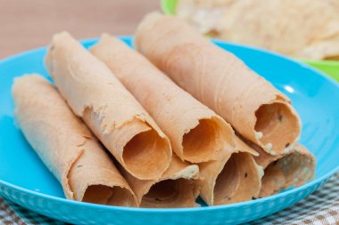 Hindistan cevizli bisküvi kıvırcık veya Taylandlı tanga muan.