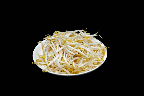 Mung bean sprout on plate and black background — 스톡 사진