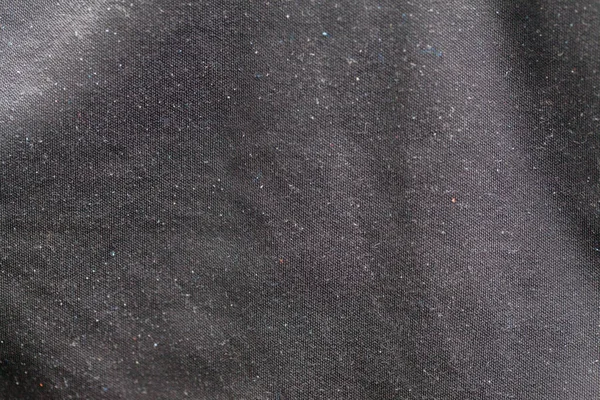 Close up of dust on black shirt — Stock Photo, Image