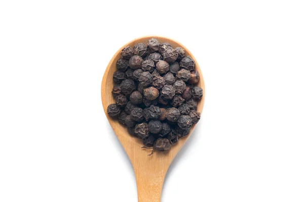 Whole Black Pepper On Wooden Spoon isolated on white background — Stock Photo, Image