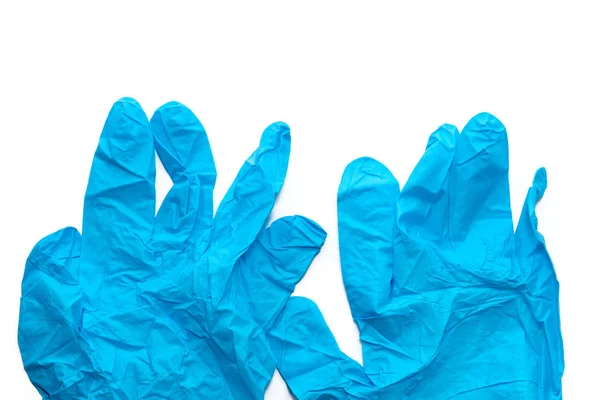 Blue thin medical glove isolated on white background — 스톡 사진