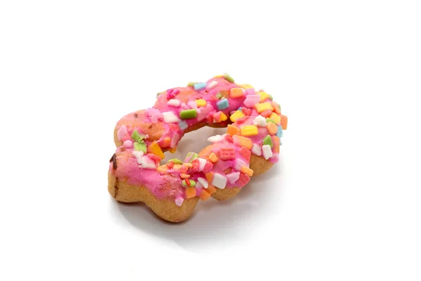 在白色背景上隔绝的彩色甜甜圈的特写 — 图库照片