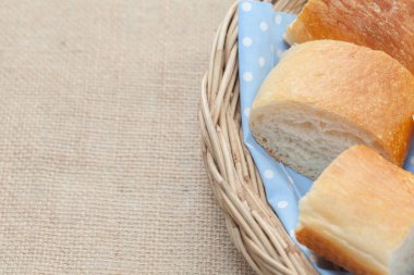 a slice of french bread on basket