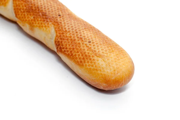 Közeli kép a francia kenyér elszigetelt fehér alapon — Stock Fotó