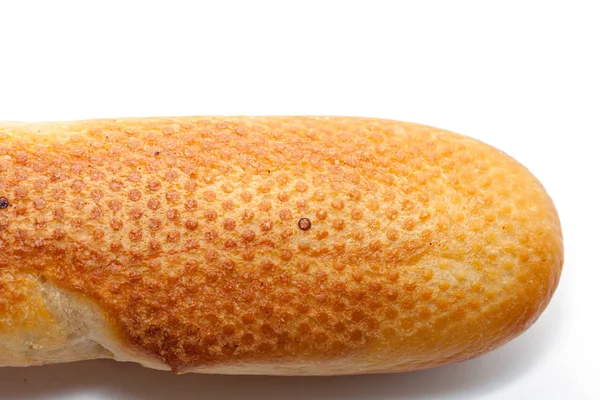 Textura abstrata do pão francês isolado sobre fundo branco — Fotografia de Stock