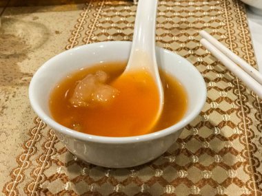close up of Chinese Sharks Fin Soup Brown Sauce