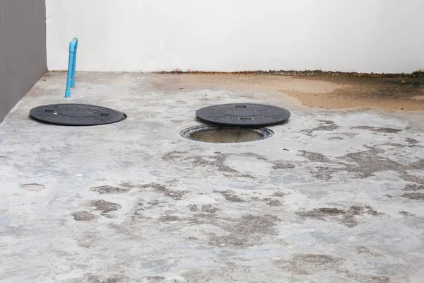 plastic caps of the septic system of the house