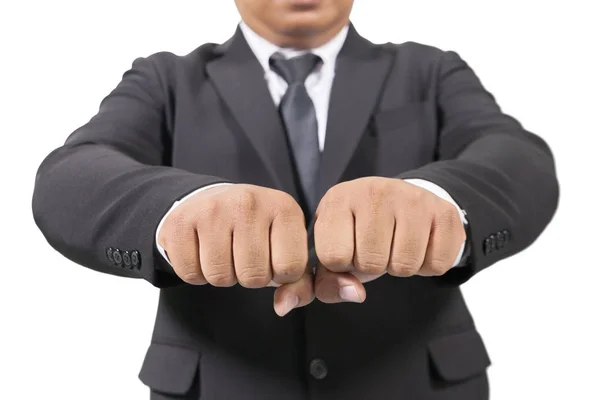 Businessman in a suit punching two hands on white background — Stock Photo, Image