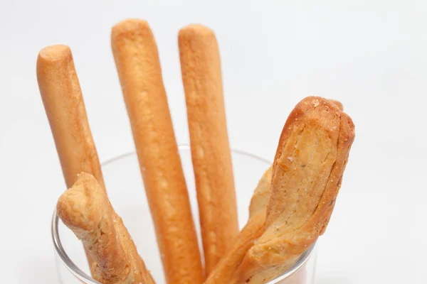 Brot Stick auf Tasse isoliert auf weißem Hintergrund — Stockfoto