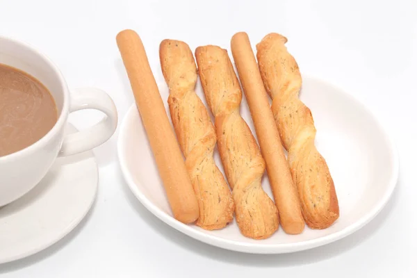 Bastoncino di pane salato e tazza di caffè — Foto Stock