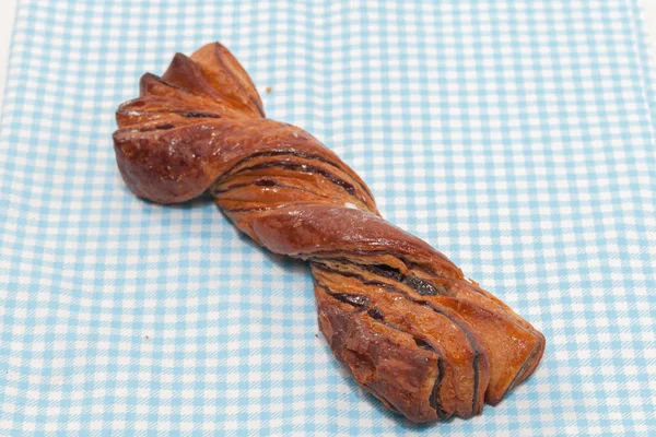 Fechar-se de pão de torção em tecido — Fotografia de Stock