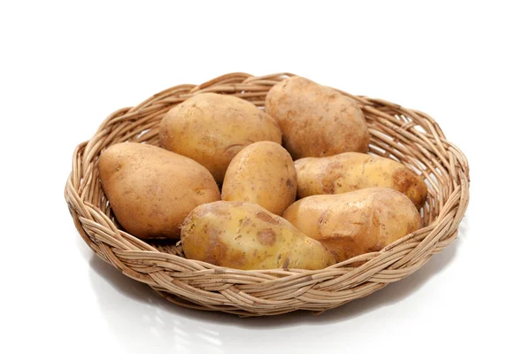 Potato on basket isolated on white background — Stock Photo, Image