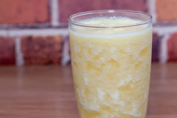 Close up of pineapple smoothie on glass — 스톡 사진