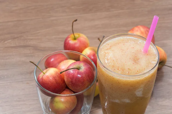 close up of apple smoothie on glass