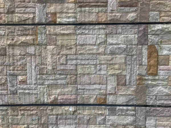 Закрыть текстуру плитки для стен из гранита — стоковое фото