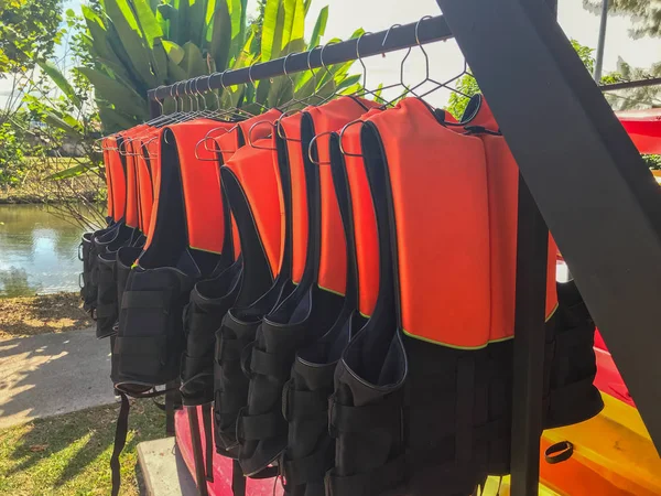 Row of life jacket hang in the cabin — 스톡 사진
