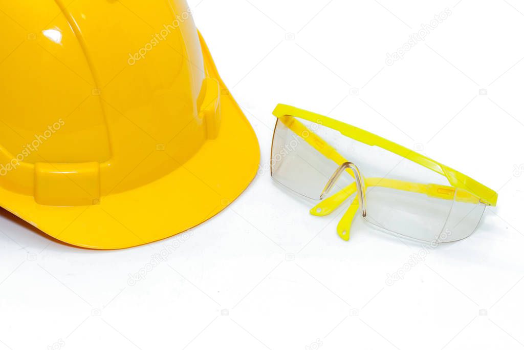 Safety Glasses protection and safety helmet on white background