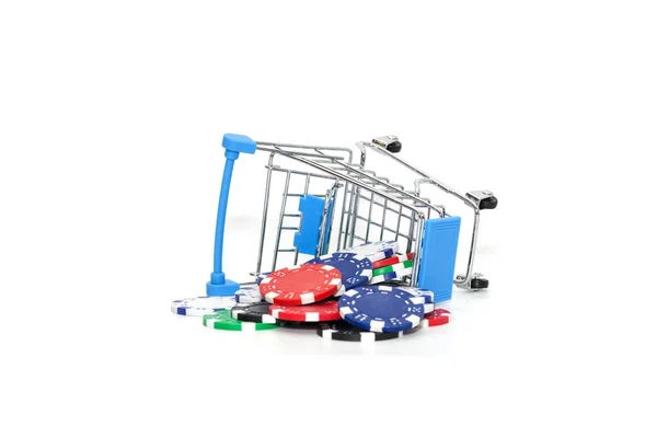 Close up of mini shopping cart with poker chips — ストック写真