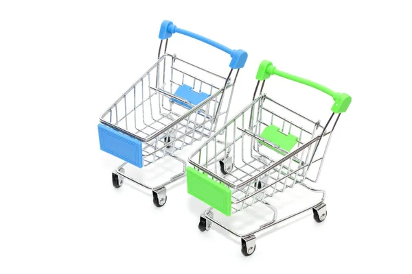 Close up of mini shopping cart on white background — Stock Photo, Image