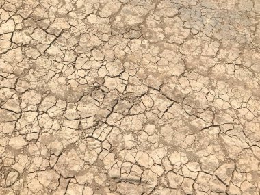 sarı çatlak kuru toprak arka plan desen ve lastik