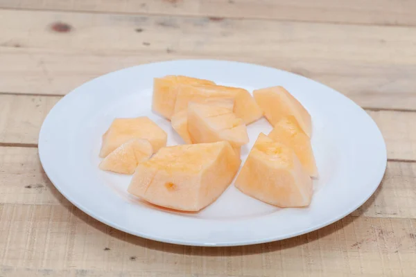 Close up of sliced of melon on plate — Stock Photo, Image