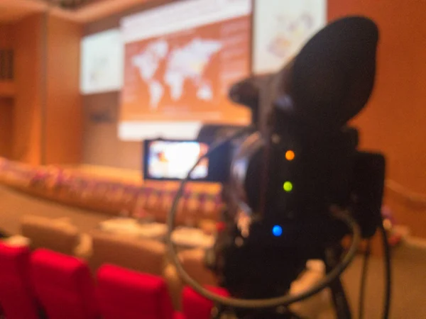 Blurry of video camera in seminar hall — Stock Photo, Image
