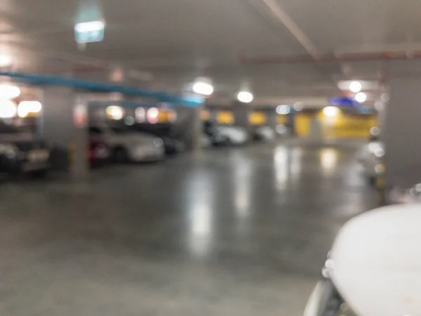 Uklart parkeringsområde ved lenestolen – stockfoto