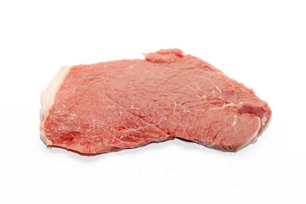 Close up of beef top side on white background — ストック写真