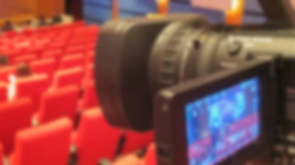 Blurry of video camera in seminar hall — Stock Photo, Image