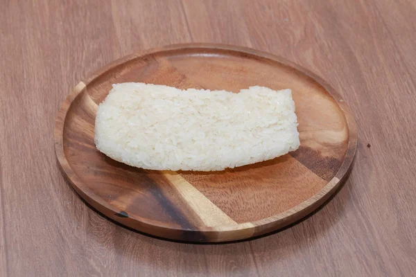 Close up of sticky rice in wooden plate — 스톡 사진